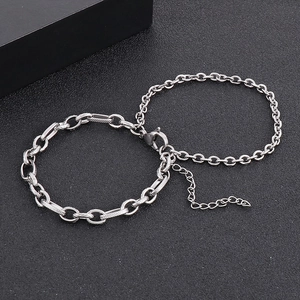 Detail of double-layered titanium steel bracelet with large link chain and lobster clasp