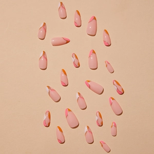 French almond press-on nails with colorful blocks and sparkling gold glitter lines