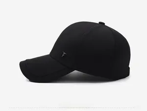 Side view of black baseball cap with metallic F logo detail and curved brim