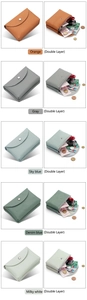 Detail of genuine leather coin pouches in various colors with double layer storage
