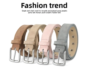Detail of four matte PU leather belts in brown beige pink and grey with silver buckles