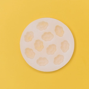 Round white silicone mold with 10 cloud cavities and Angel text for handmade soap making