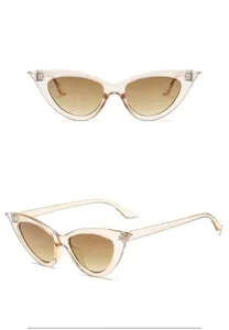 Front and 45-degree side view of champagne cat eye sunglasses with metal hinge detail