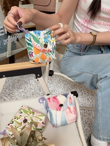 Mini floral cotton storage pouch with buckle and portable purple ring on camping chair