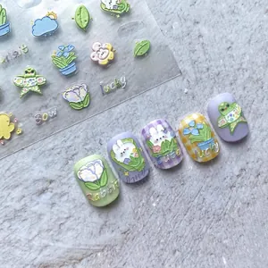 Detail of 5D embossed nail stickers featuring colorful rabbits, flowers and 3D relief texture