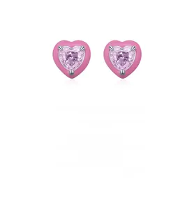 Detail of s925 silver heart stud earrings featuring pink enamel and central crystal stones