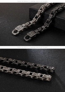 Macro shot of punk style stainless steel bracelet with engraved auspicious cloud pattern