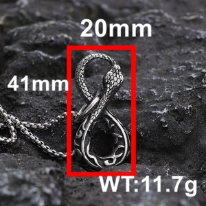 Macro detail of punk style snake pendant showing scale textures and 41mm height measurement