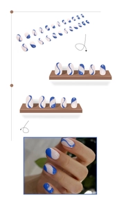 Blue wavy stripes on white press-on nails set with glitter and real finger display