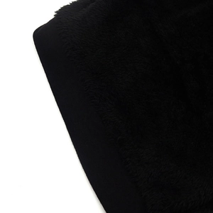 Detailed close-up of the black fleece lining and seamless stitching on the beanie hat