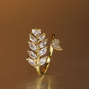 Elegant adjustable gold leaf ring with sparkling marquise zircon and crystal accents