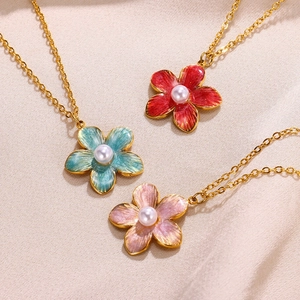 Chic gold-plated flower necklaces with pearl and enamel pendants in red, blue, and pink