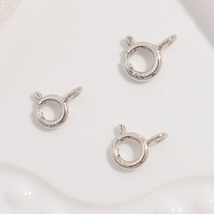Three pieces of polished S925 sterling silver spring ring clasps for jewelry making