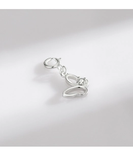 Detail of S925 sterling silver hollow butterfly pendant with sparkling crystal stone