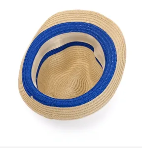 Internal view showing beige straw sun hat weaving texture and inner sweatband detail