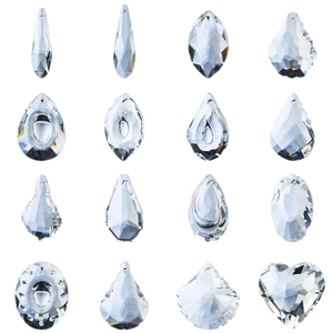 Set of 16 assorted clear crystal glass pendants in various geometric cuts on white background