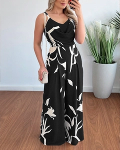 Detail of floral printed wide-leg jumpsuit with V-neck spaghetti straps in black and white