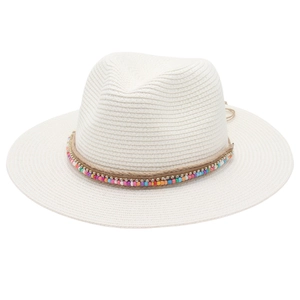 Detailed macro view of white woven straw fedora hat featuring vibrant colorful beaded band
