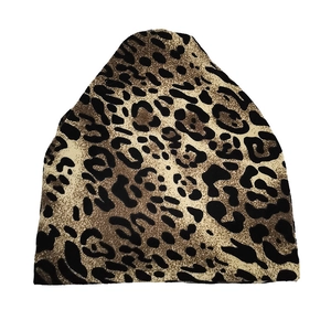 Versatile leopard print knit neck gaiter and slouchy beanie hat for winter warmth