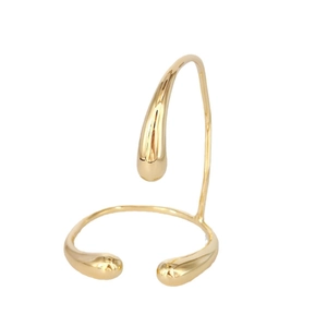 Gepolijste gouden lava manchete armband met minimalistisch druppelontwerp en open stijl