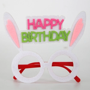 Close-up of Happy Birthday party glasses featuring cute rabbit ears and colorful felt letters