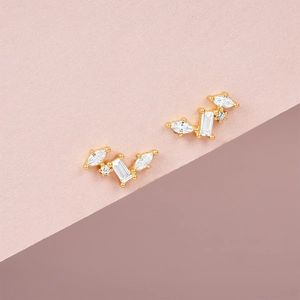 Detail of S925 silver earrings with marquise and drop-shaped sparkling zircon stones