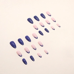 Klein blue almond press-on nails with French tips and sparkling glitter finish