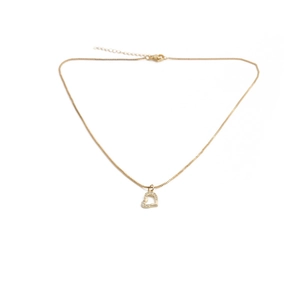 Close-up of a gold heart pendant necklace with shimmering micro-pave cubic zirconia