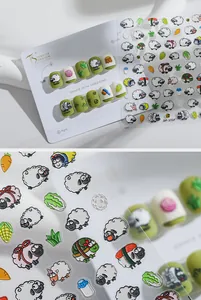 Detailed 3D embossed nail art stickers featuring cartoon sheep, corn and sushi motifs
