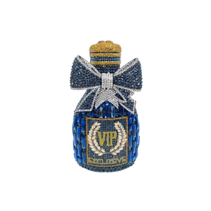 Close-up of luxury blue crystal clutch bag with gold trim and bow-knot VIP emblem