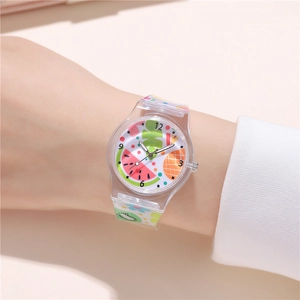 Close-up of kids quartz watch with colorful fruit patterns on clear resin strap