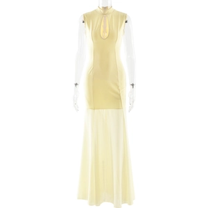 Detail of elegant yellow sleeveless gown featuring a keyhole cutout and mesh mermaid skirt