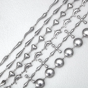Silver stainless steel chain necklace with heart and dolphin shaped hollow pendants