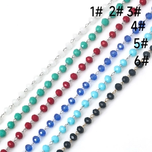 Close-up of handmade stainless steel beaded chains in six various vibrant colors
