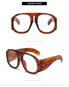 Macro shot of brown stripe oversized frames with thick temples and premium finish