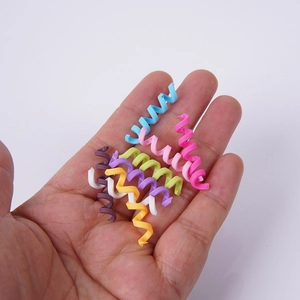 Colorful polymer clay spiral rolls for DIY dessert decoration and cable protection