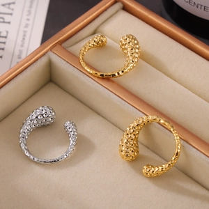 British style hammered gold and silver titanium steel open rings in a velvet jewelry box