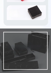 Detail view of black marble jewelry gift box with matching paper bag and sponge insert