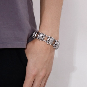 Close-up of hip hop skull bracelet in stainless steel on male model's wrist