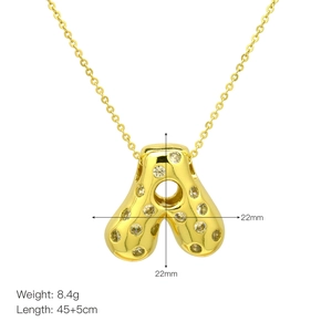 Detailed view of gold letter A balloon pendant with size specs and necklace dimensions