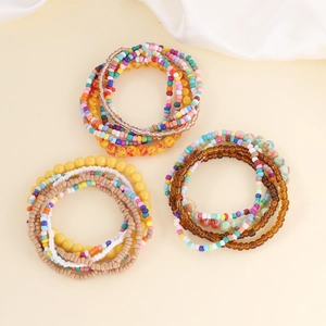 Bohemian multi-layer seed bead bracelet set with colorful stackable designs for women