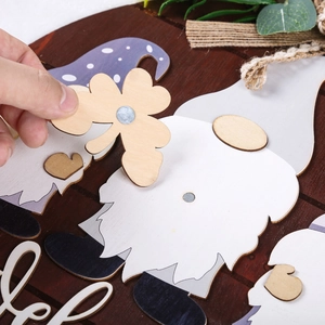 Close-up of magnetic DIY wooden welcome sign featuring interchangeable clover accessory