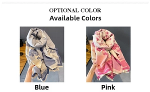 Detail of floral knit scarf with fringe edge in blue and pink color options