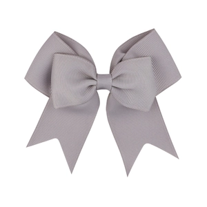 Detailed view of grey grosgrain ribbon texture on double-layered girls' hair bow