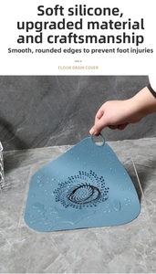 Copertura scarico a pavimento in silicone blu scuro con maniglia e filtro capelli