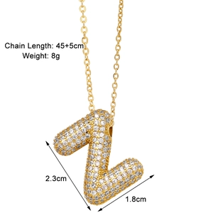 Detailed view of gold letter Z pendant necklace with zircon inlay and dimensions