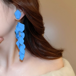 Detail view of blue multilayer rose petal tassel earrings with elegant gold accents