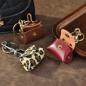 Retro mini leather coin purse keychain charms in brown, red, and leopard print