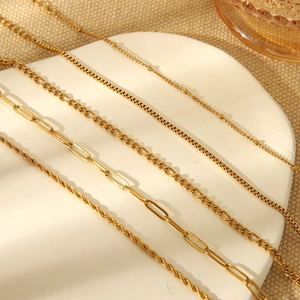 Five styles of 18K gold plated stainless steel chains including rope and paperclip links