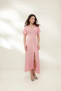 Close-up of pink V-neck knitted maxi dress featuring button-front and ribbed texture